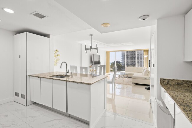 Building Photo - 10275 Collins Ave