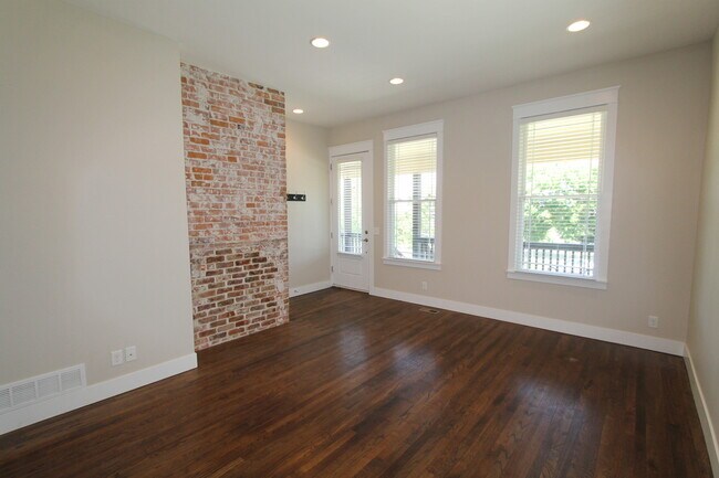 Building Photo - Midtown Renovated Duplex - Hardwood Floors, Exposed Brick