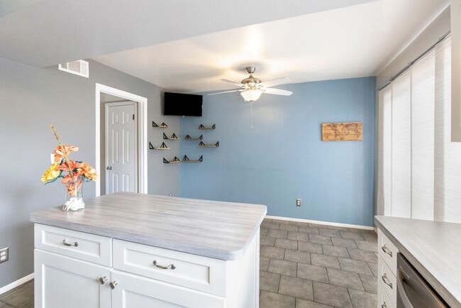 Building Photo - Discover this charming two-story townhome