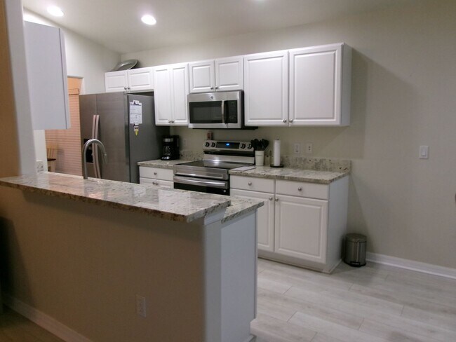 Building Photo - Desirable Gated Sandoval of Cape Coral