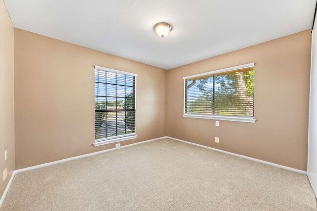 Building Photo - "Charming garden home offers 3-Bedroom Sanctuary with Cozy Fireplace in San Antonio – 1710 Sq Ft ...
