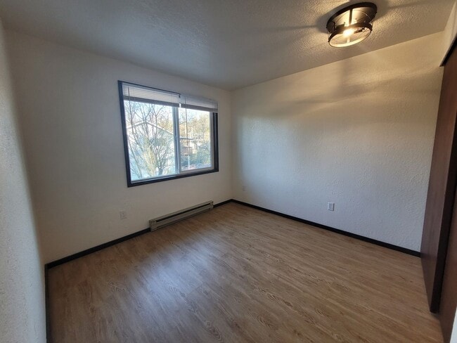 Building Photo - 3 Bedroom Home w/ Cozy Wood Burning Stove