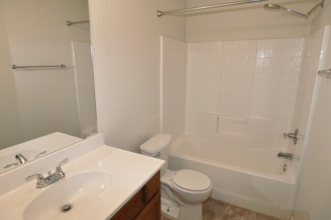 Building Photo - "Warm And Welcoming 3-2-2 With Open Living In a Prime Location!"