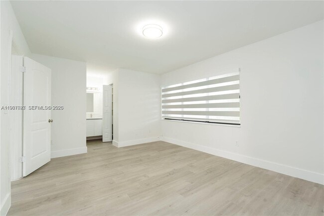 Building Photo - 6080 W 26th Ct