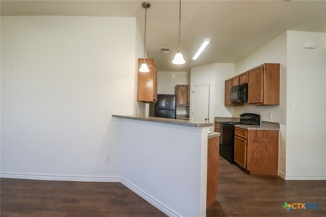 Building Photo - 909 Lasso Dr