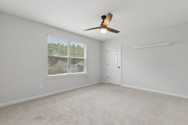 Building Photo - Spacious 4-Bedroom Home in Amelia Walk wit...