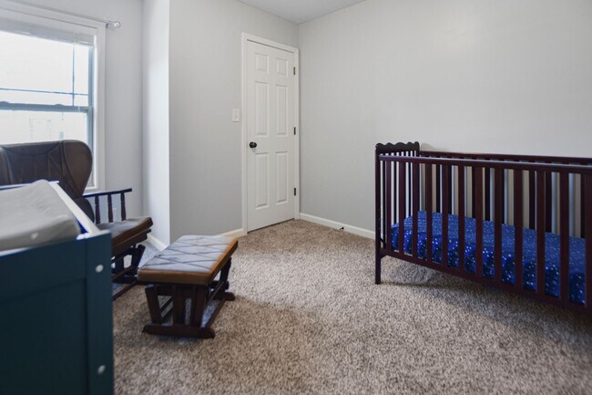 Building Photo - Pet Friendly Three Bedroom with Bonus!