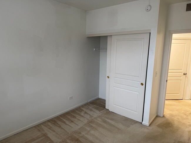 Building Photo - Partially Furnished - Bright & Spacious 2BR/1.5 BA CONDO - End-Unit w/ 2-Car Garage, Appliances, ...