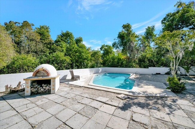 Building Photo - ALL THE CHARM! - Siesta Key 1+ acre on the Bay - 3 bed/ 2 bath pool home