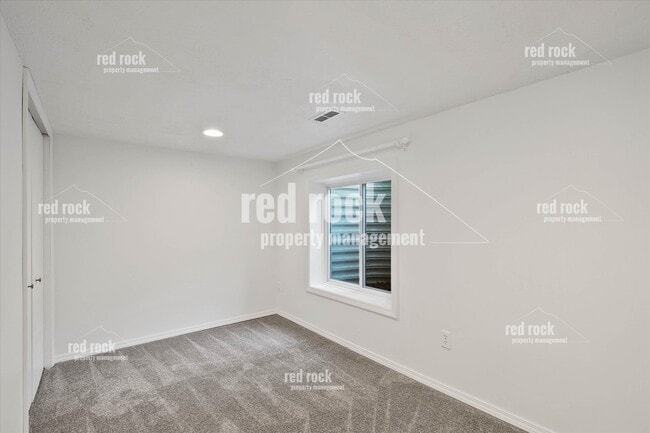 Building Photo - 2211 E 49th Ave