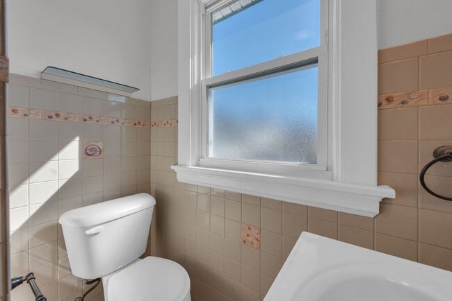 Building Photo - NORWOOD – Stunning Old-World Charm with Modern Comforts