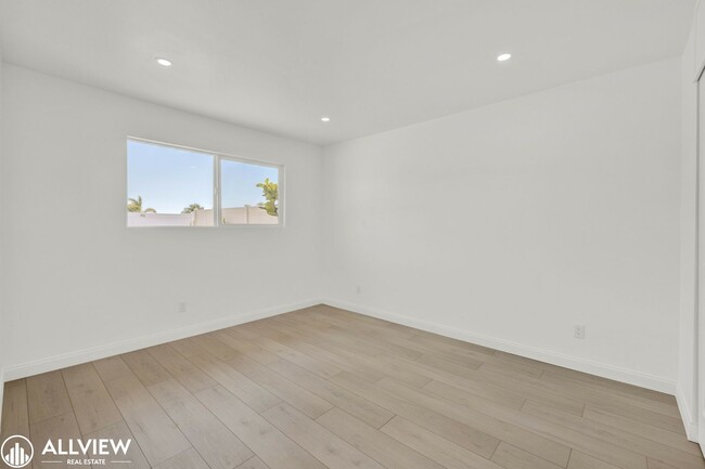 Building Photo - Fully Renovated 4-Bedroom Home with Firepl...
