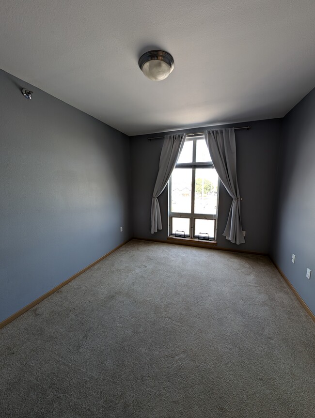 Main floor bedroom - 2121 S Kinnickinnic Ave