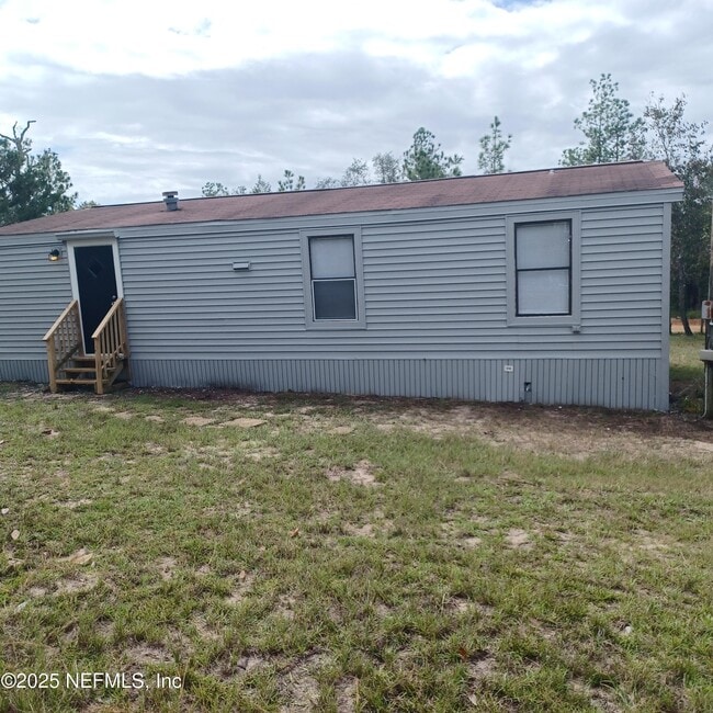Building Photo - 6184 Cornell Rd