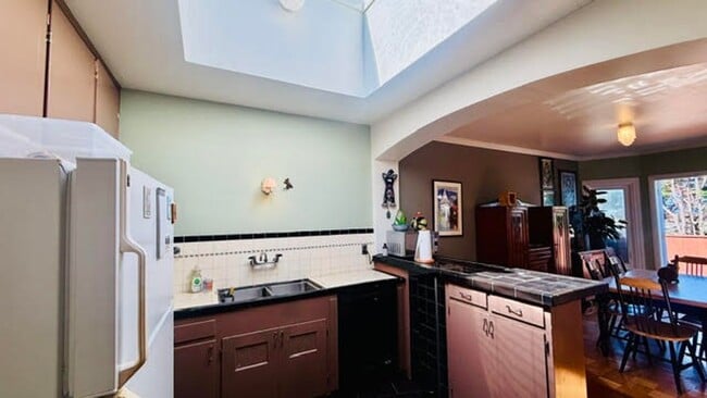 Building Photo - Whimsical 2BR/1BA, Outer Parkside Gem and Dog Friendly! FURNISHED Flexible Lease Term