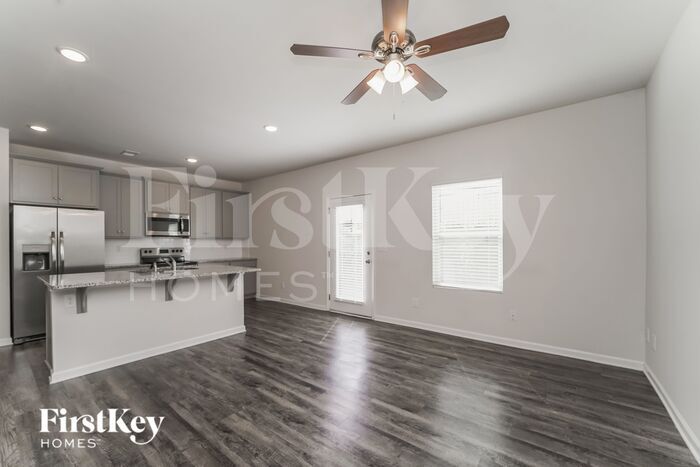 Building Photo - 10714 Rivergate Dr NW