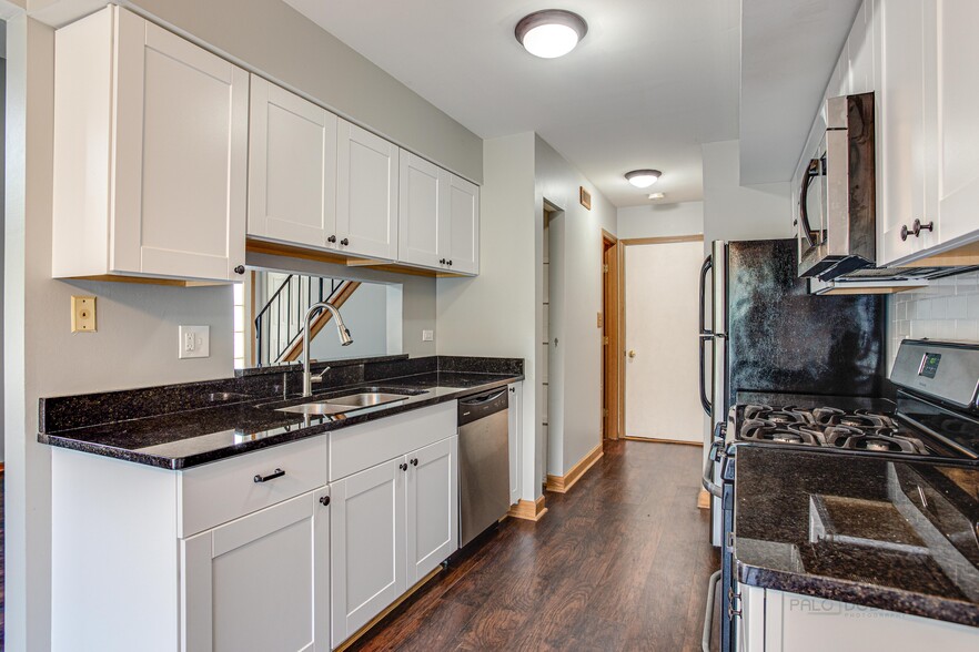 kitchen with pass-through - 240 Acorn Dr