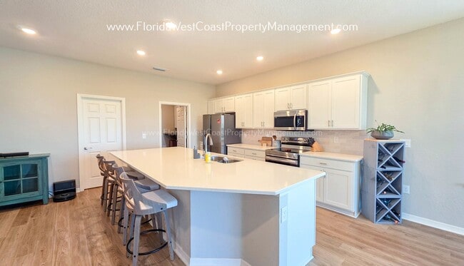 Building Photo - BRILLIANT 4 BEDROOM/2.5 BATH HOME AVAILABLE IN AVIARY at RUTLAND RANCH PARRISH!