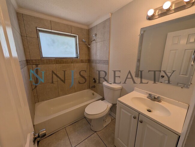 Building Photo - 3 bed,2 bath ~ With garage, workshop & shed!! NEW floors, NEW paint! Updated bathroom & kitchen w...