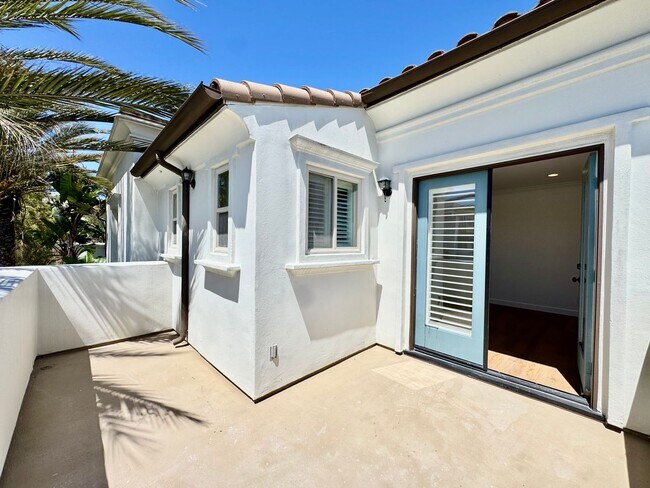 Building Photo - Beautifully Remodel Townhouse with AC & Two Car Garage!