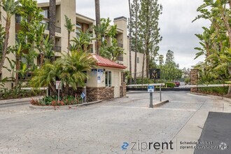 Building Photo - 1 br, 1 bath Condo - 5545 Canoga Ave, Wood...