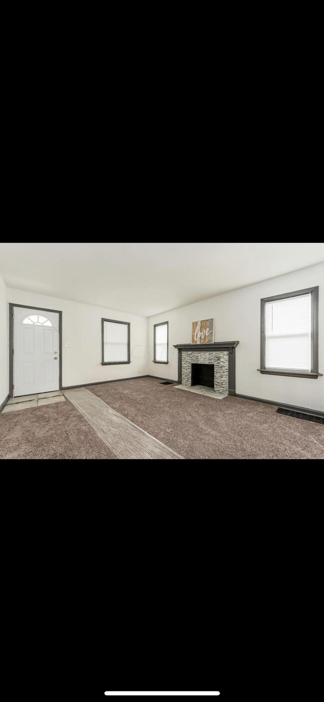 Building Photo - 1246 E 22nd Ave