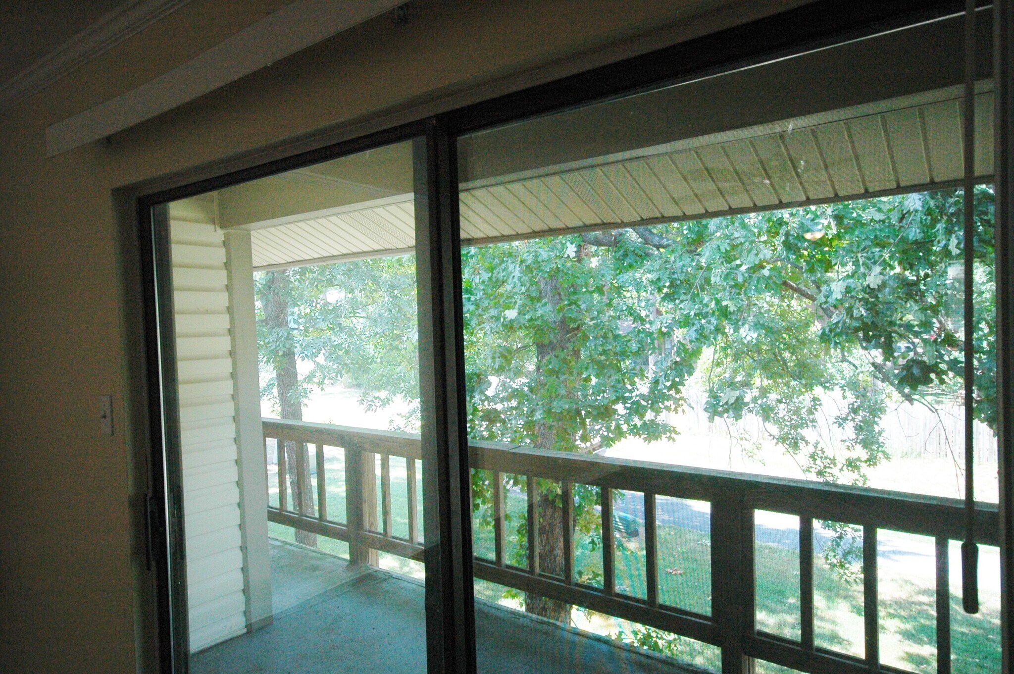 Large back balcony overlooking walking paths - 101 Pine Forest Dr