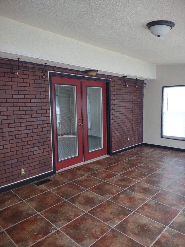Sunroom accessible via Master Bedroom double doors - 120 Arrow Lands Trl