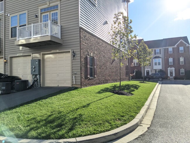 Building Photo - Bottom level (two story) *END UNIT* condo ...