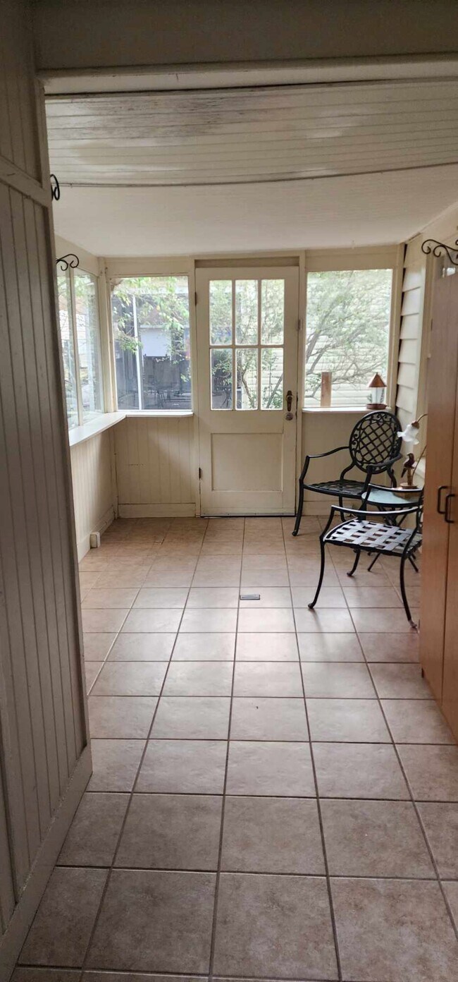 Enclosed back porch - 1423 Bronough N St
