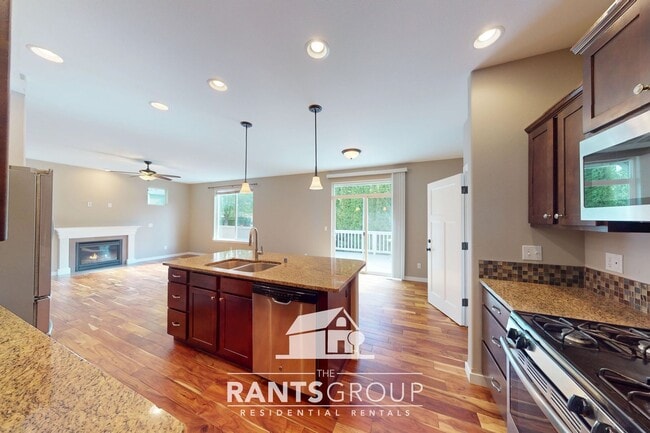 Building Photo - Stunning 4-Bedroom, 2.5 Bathroom Home on a...