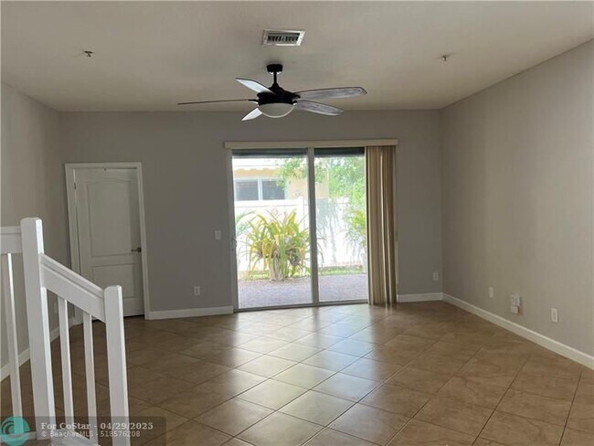 Building Photo - 9428 SW Merlin Ct