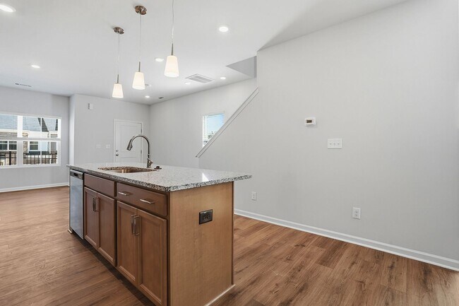Building Photo - BRAND NEW TOWNHOME-9 FOOT CEILINGS-TWO CAR GARAGE-POOL COMMUNITY