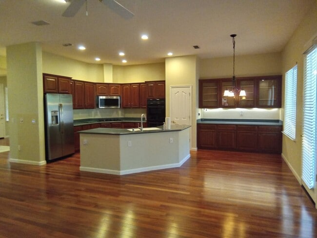 Building Photo - Gated: Single Story Heritage Oaks 3 Bedroom Plus Office/Den 3 Car Garage with lots of built in fo...