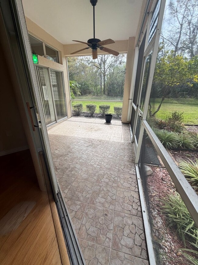 Building Photo - First floor condo in gated East Lake Woodlands of Oldsmar with one car garage