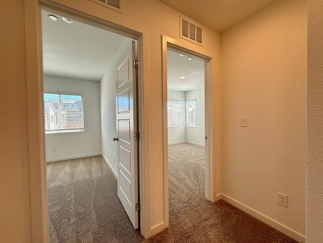 Building Photo - 4 BED 3 BATH 2 CAR GARAGE TOWNHOUSE + LOFT ON CORNER LOT w/ BALCONY