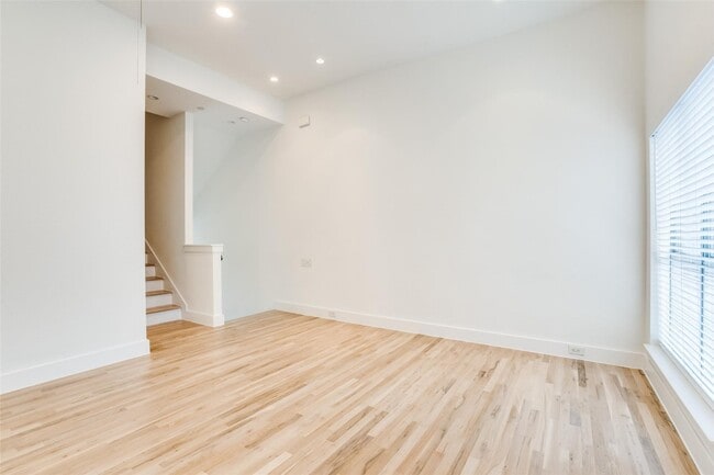 Building Photo - Beautiful townhome featuring granite countertops, hard wood floors, and a small private yard grea...