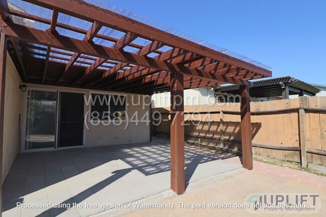 Building Photo - 4 bed, 2 Bath Home With Fenced Yard and attached 2 Car Garage