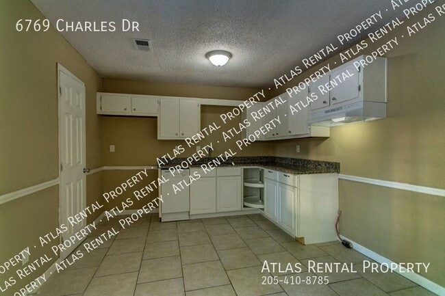 Building Photo - 6769 Charles Dr