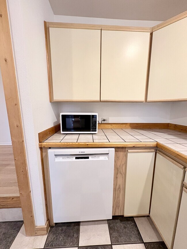 Quiet dishwasher and new microwave oven - 21204 3rd Ave S