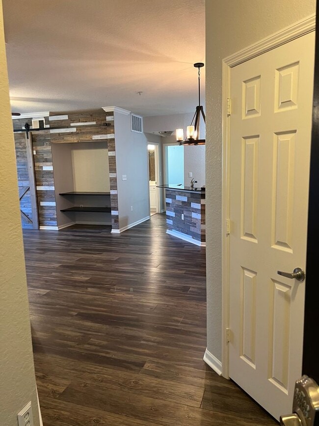 Building Photo - Spacious 3BR/2BA Gated Condo with Resort-Style Amenities!