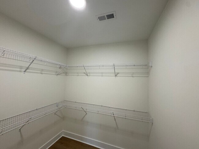 Building Photo - Brand New Luxury Condo - Top Floor