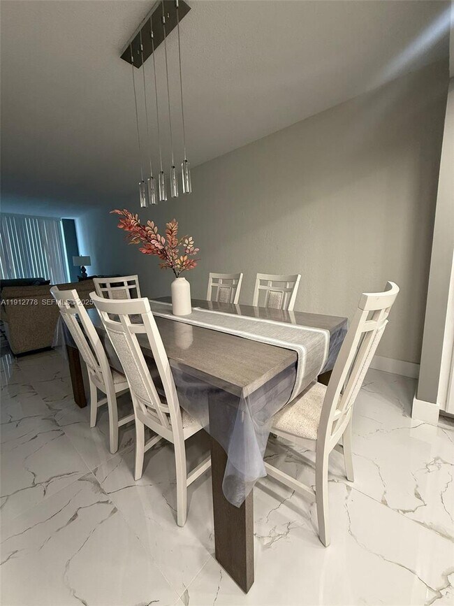 Building Photo - 19380 Collins Ave