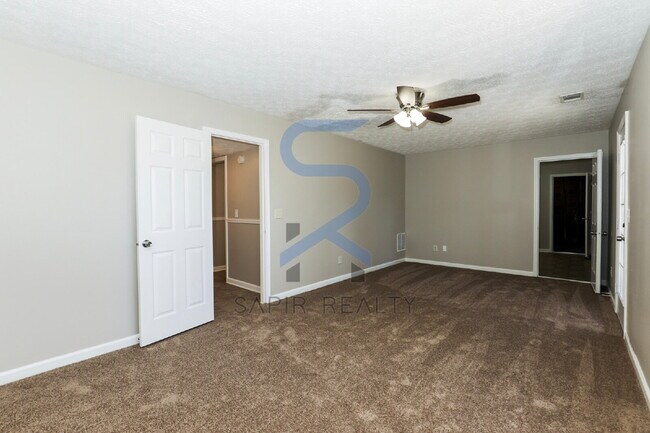 Building Photo - Move in before February 28th and choose your reward: a $250 Amazon Gift Card or a 55" Smart TV!