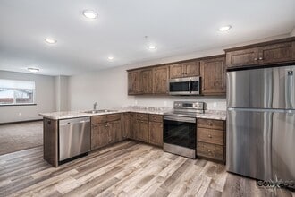 Building Photo - SPACIOUS AND MODERN TOWNHOME