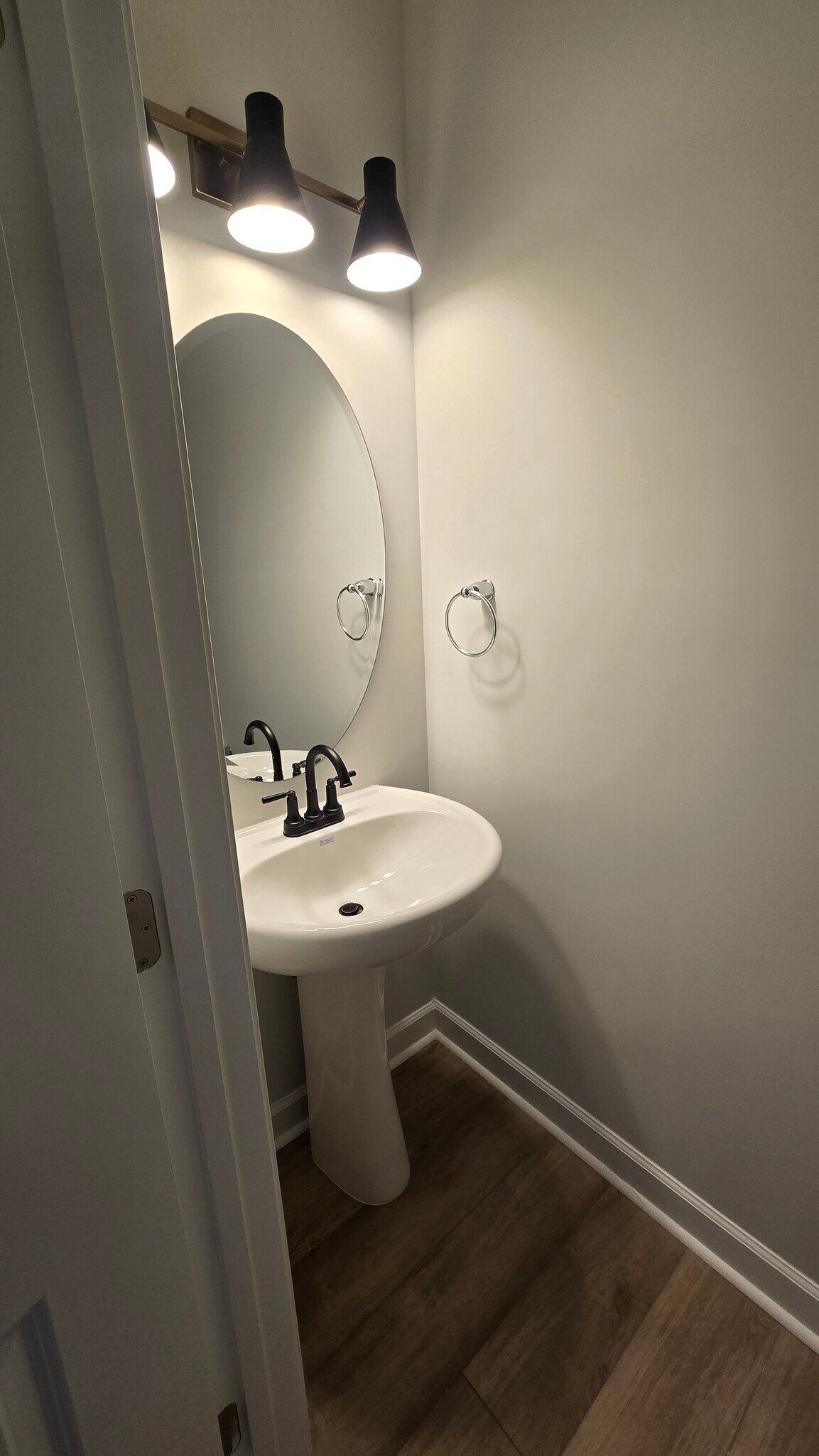 Powder room on 1st floor - 55 Paper Birch Trl