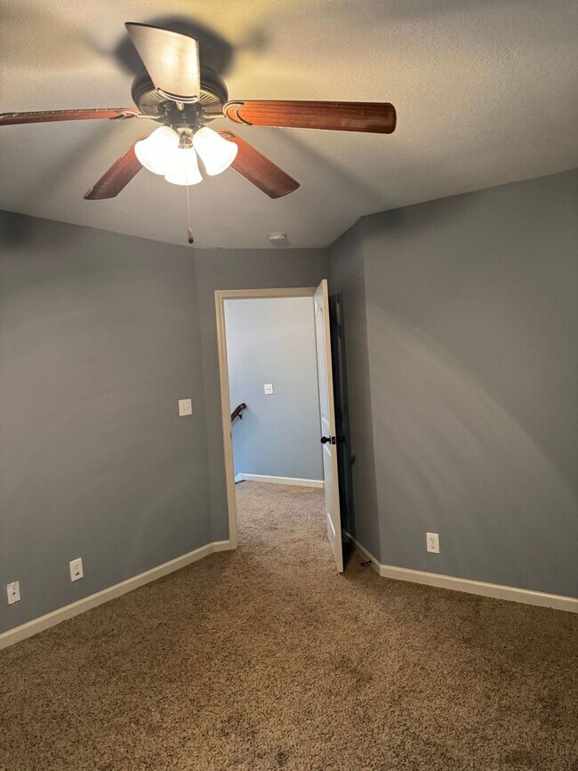 Building Photo - Large Open 4 Bedroom Home with Bonus! Tree Lined Backyard with Privacy Fence!