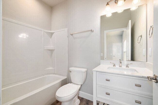 Building Photo - The Reef Townhome NOW LEASING FOR FALL 2026!