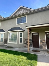 Building Photo - 2-Bedroom Townhome with Central AC and Covered Parking
