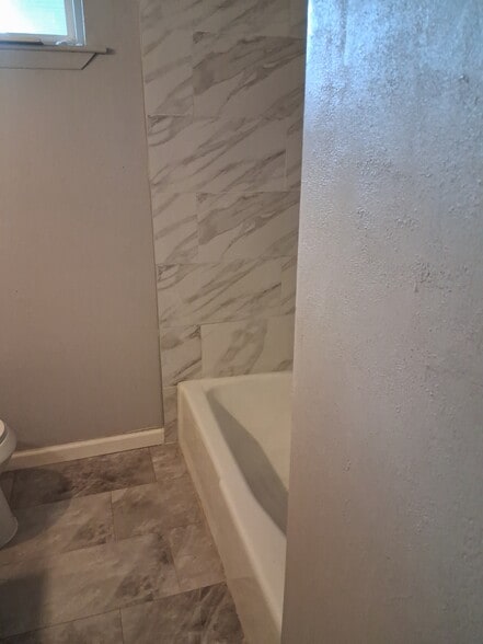 New tile - 8020 Haney Dr